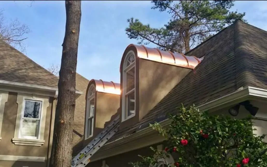 NewImageRoof_coner of a residential rooftop with windows