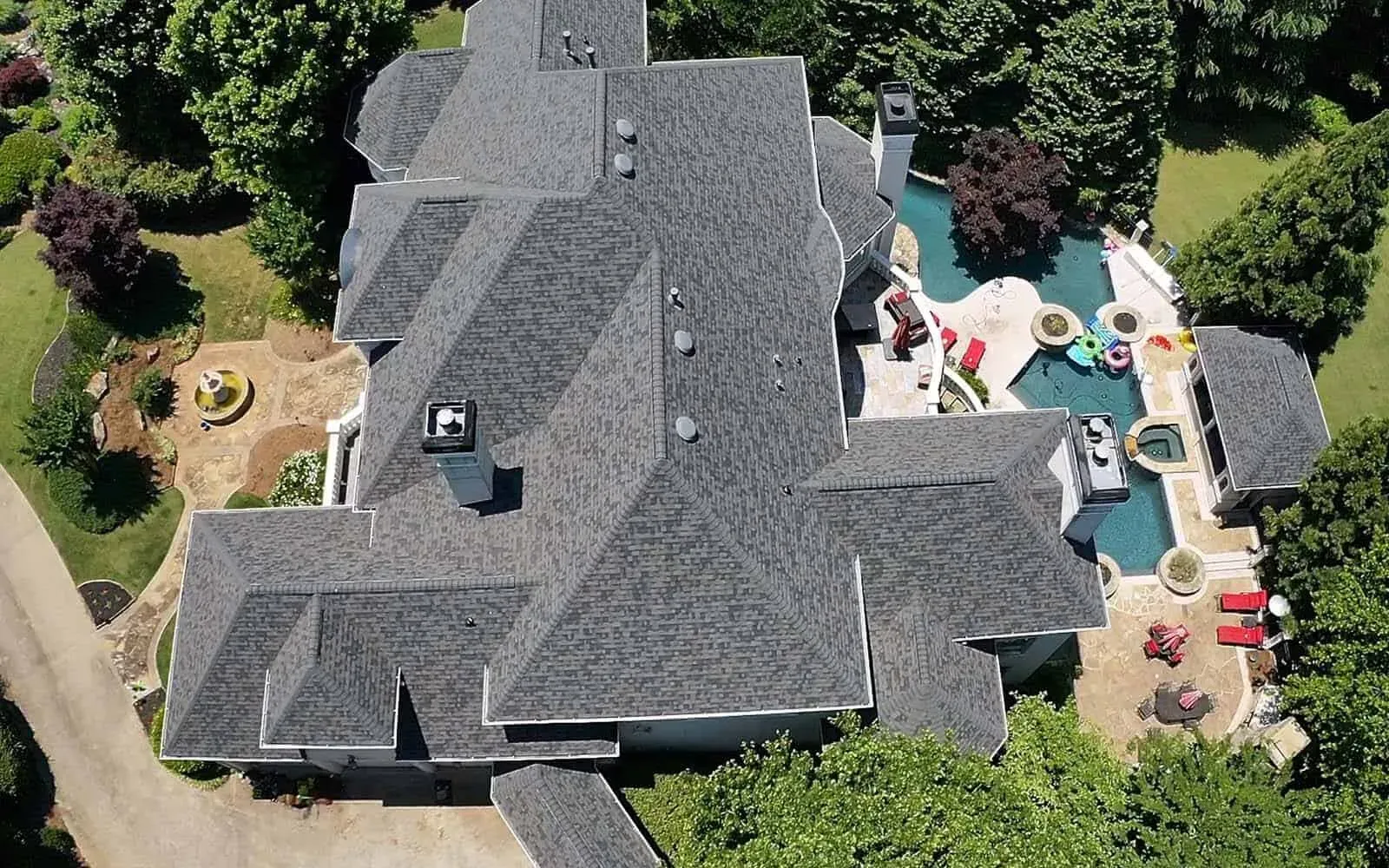 NewImageRoof_overhead view of large house rooftop