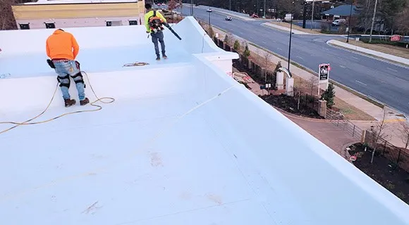 low slope roof maintenance and cleaning