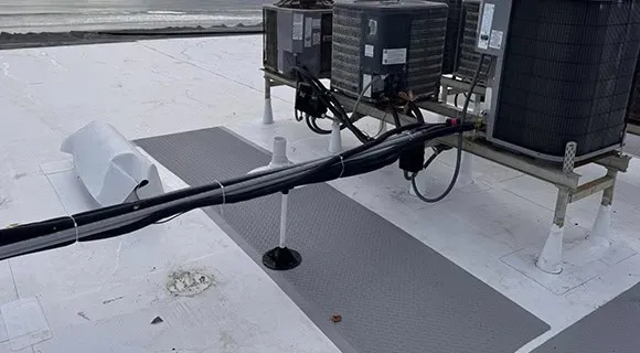 new construction membrane roof walkways equipment