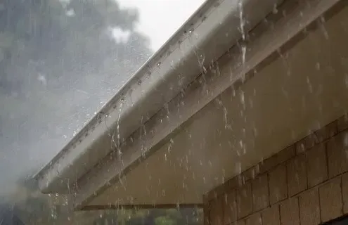 roof gutter system diverting water