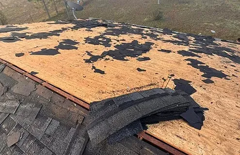 severe residential roofing system damage