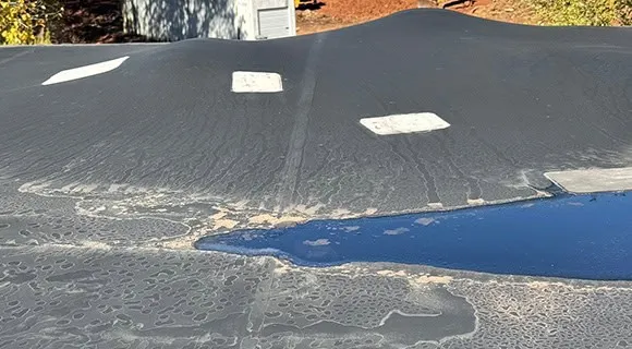 standing water on membrane flat roof