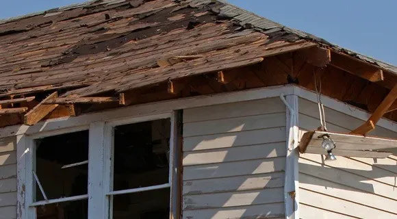 tornado damage roof home